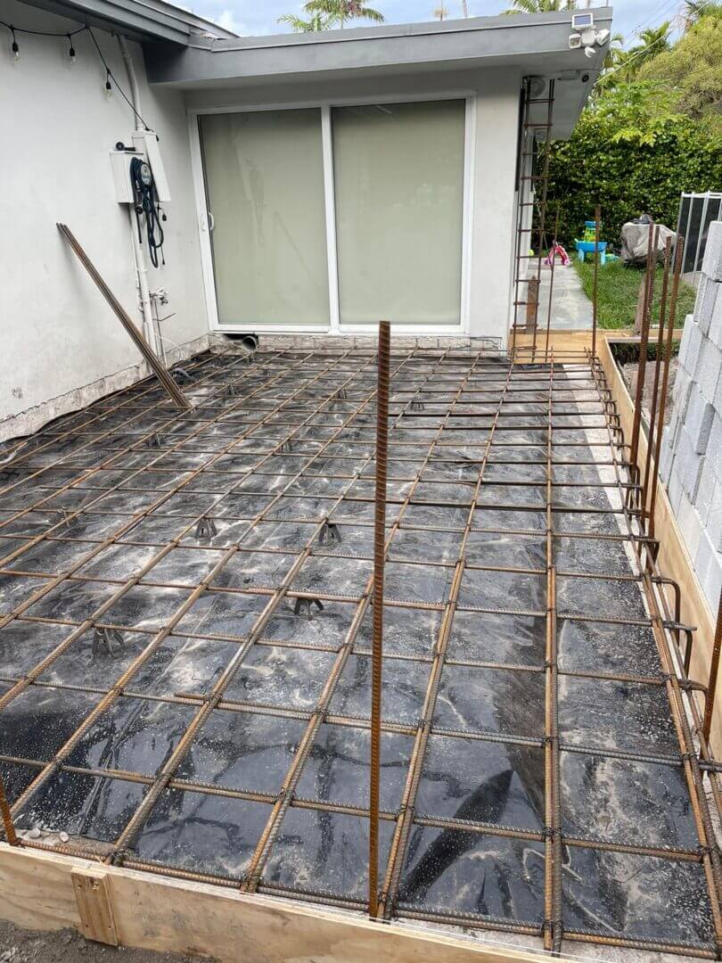 Rebar mat over vapour barrier ready for a residential patio pour
