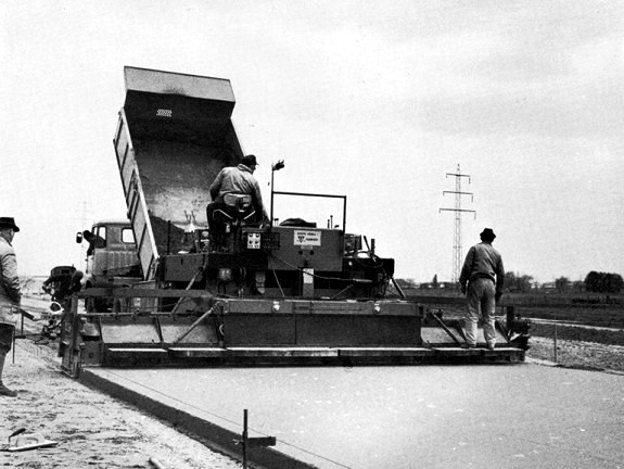 Asphalt paving crew at work on a new road