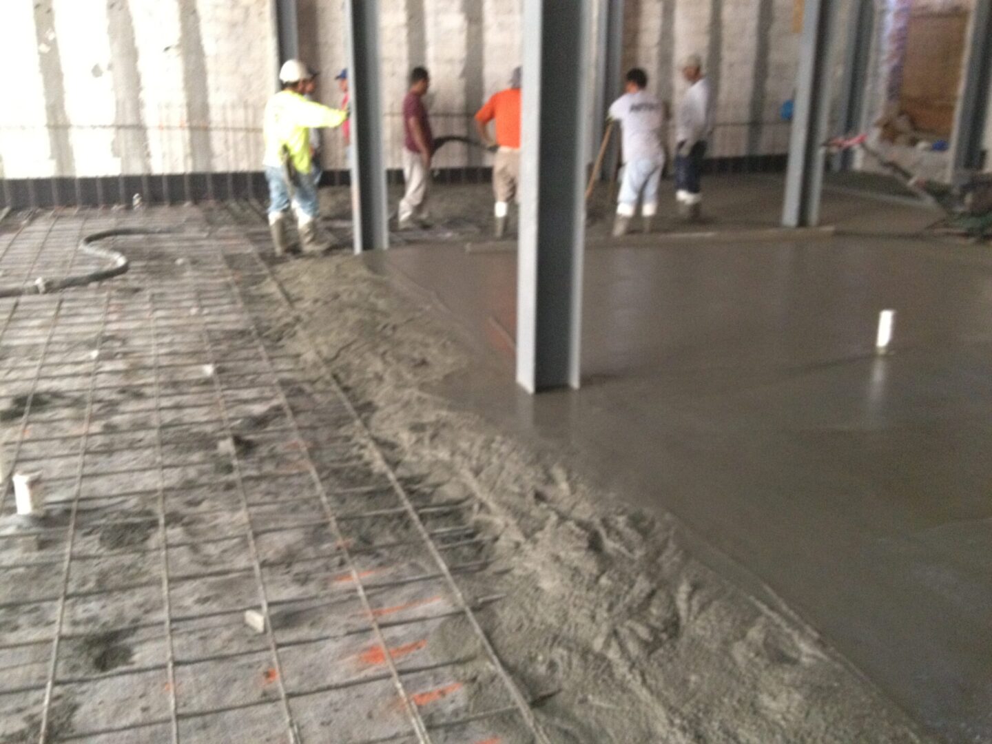 Closeup shot of the people working on slab on the display